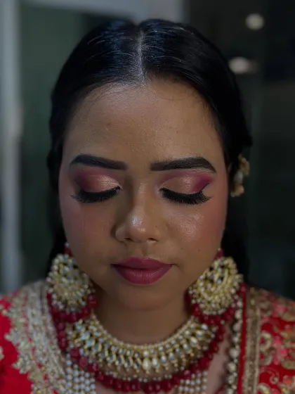 A detailed shot of the eye makeup for a bridal look. Our students learn to create intricate and well-blended eyeshadow looks for any occasion.