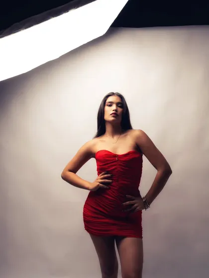 A classic hands-on-hips power pose. This is a must-have shot for any model looking to project strength and confidence.