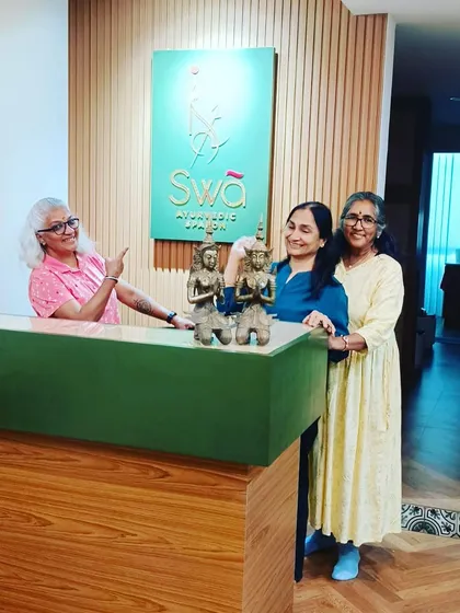 Happy clients posing at our reception desk. It's always a joy to see smiling faces leaving the spalon.