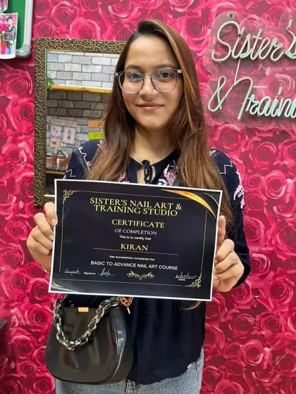 A proud moment for Kiran as she holds her certificate for the Basic to Advance Nail Art Course. We make sure every student leaves our studio feeling accomplished and ready for clients.