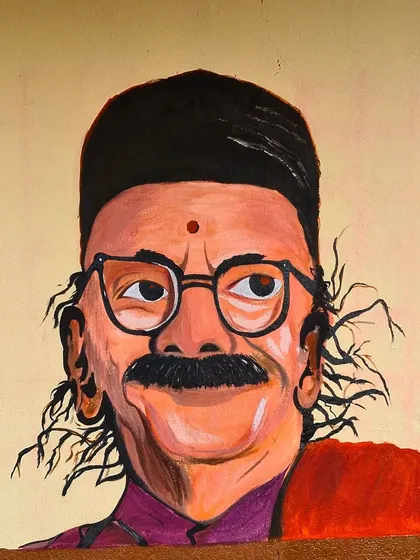 I was honoured to paint this large scale portrait of the great Kannada poet Dr. D. R. Bendre at a government primary school in Hubli. Using acrylics, I aimed to capture his iconic presence to inspire the students who see it every day.