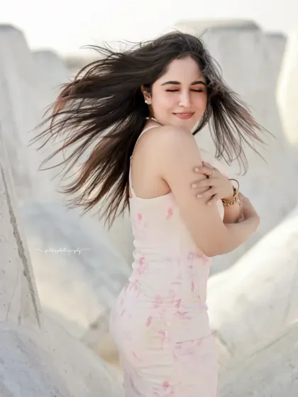 A series of carefree portraits of an actress on the beach. I captured the natural movement of her hair in the wind to create a sense of freedom and joy.