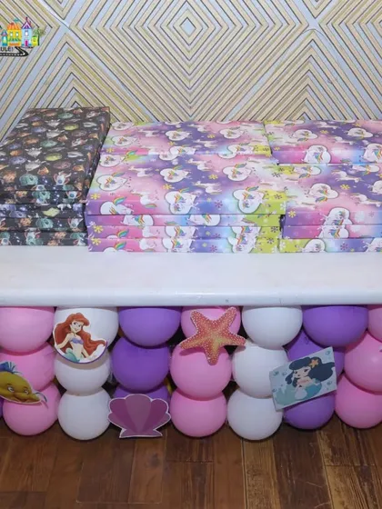 Return gifts all ready to go for a Little Mermaid themed party, with the decor matching the under-the-sea vibe.