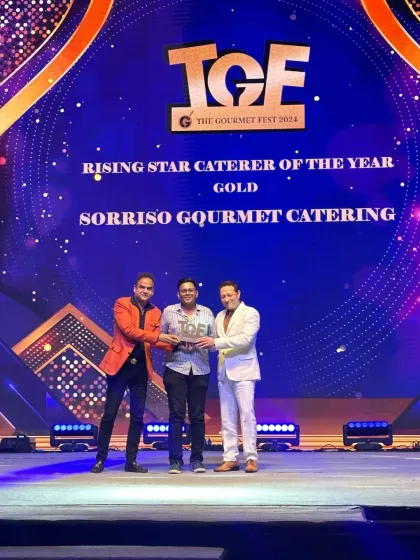 On stage receiving my award at The Gourmet Fest. This recognition fuels my passion for bringing innovative and exceptional service to every event.