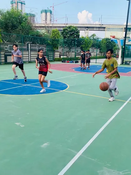 A player dribbles the ball, looking for an opening.