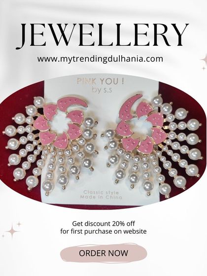 An example of the trendy, imported party wear earrings I stock. These pink floral and pearl earrings are lightweight and perfect for a day event.