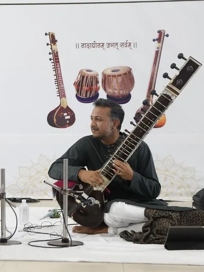 A moment of quiet reflection during my performance at the Saptak Sangeet Sankalp in Ahmedabad. The backdrop beautifully illustrates the instruments that create our music: the Sitar, Tanpura, and Tabla.