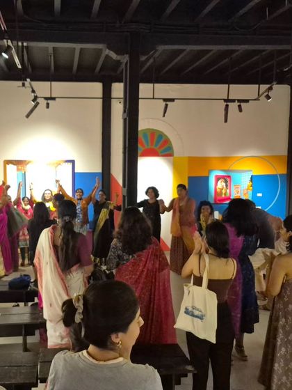 Women dancing together, celebrating their art and their existence. This is a scene from a magical night where art, performance, and community came together in a powerful display of solidarity.