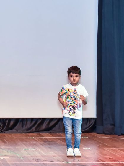 Aadil looking like a pro on stage. We teach not just steps, but also the attitude and confidence of a performer.