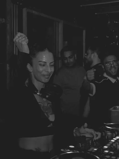 A candid moment of joy behind the decks at The Kai Room. When the crowd is giving you this much energy, you can't help but smile.
