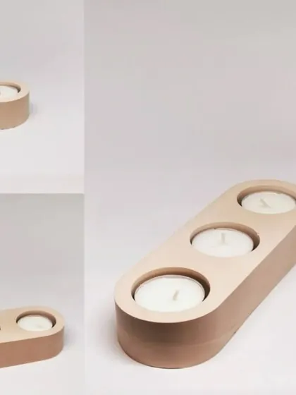 This image shows the finished products made from our multi-cavity T-light holder moulds. They create sleek, functional, and stylish holders for your tea light candles.