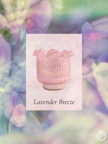 The Lavender Breeze fragrance in a purple Zen Lotus votive is a perfect calming companion to carry your mind, body, and soul through the summer season.