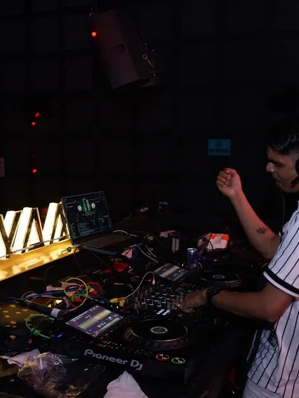 A side view of my setup at Maya, with the club's logo in the background.