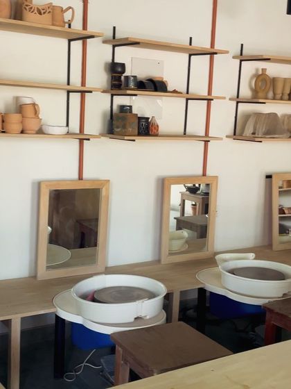 This poster announces our August-September weekend potter's wheel batch for beginners. The image shows the wheel throwing area of the studio, ready for new students.