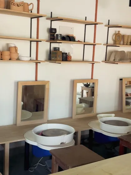 This poster announces our August-September weekend potter's wheel batch for beginners. The image shows the wheel throwing area of the studio, ready for new students.
