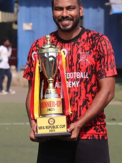 Our head coach proudly holds the runner-up trophy from the MFA Republic Cup 2025. This trophy represents the immense effort and dedication of our senior team throughout the tournament.