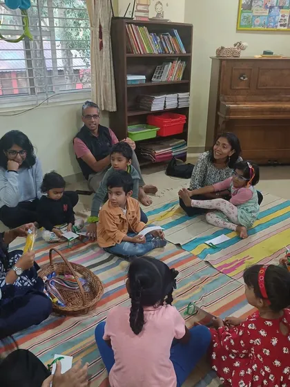 A candid moment of interaction and collaboration during a craft session.