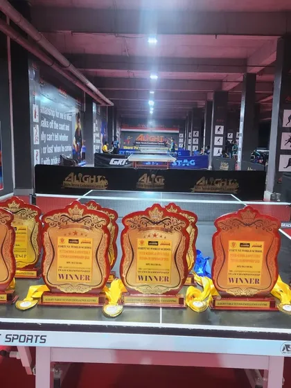 Trophies lined up and ready for the winners at the Fortune World School Interschool Tournament. I believe in celebrating every achievement, big or small.