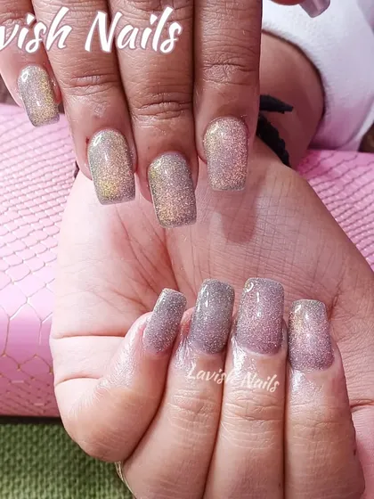 A full-coverage holographic glitter polish that shifts colors in the light.