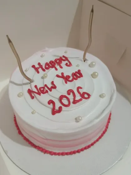 Another design for a New Year's celebration cake, this one with candles ready to be lit. I can create these simple, elegant cakes in different colors and flavors.