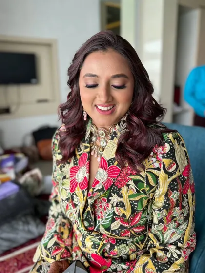 A happy smile from my Sangeet client. The soft waves and defined eyes create a look that is both glamorous and approachable.