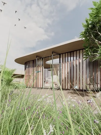The rooftop lounge of "The Sanctuary" is designed as a serene escape, surrounded by wild grasses and flowering plants. The curved wooden screen provides a sense of enclosure while remaining open to the sky and surrounding nature.