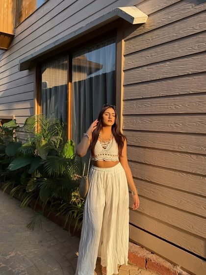 A full-length shot of my white-on-white look.