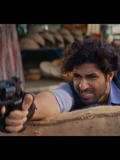 An action shot from the Freefire film, highlighting the custom-styled vest and shirt combination that gives a nod to the original Sholay character while feeling modern.