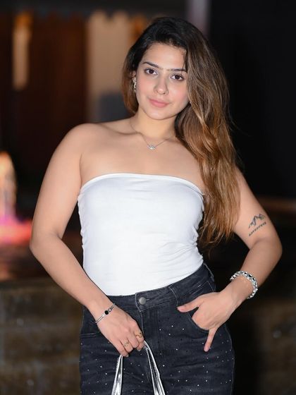 A friendly and approachable smile, showing versatility even in an edgy shoot.