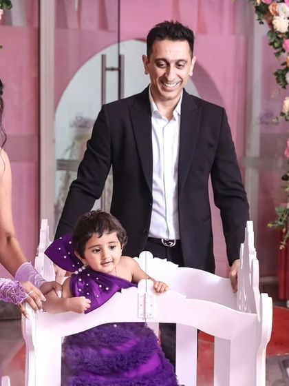 A thrilling 'Spiderman' themed birthday party, with red and blue decor, spiderweb props, and a cityscape backdrop, ready for web-slinging action.