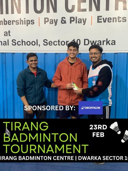 A smiling winner with his prize. Successful events are built on strong partnerships.