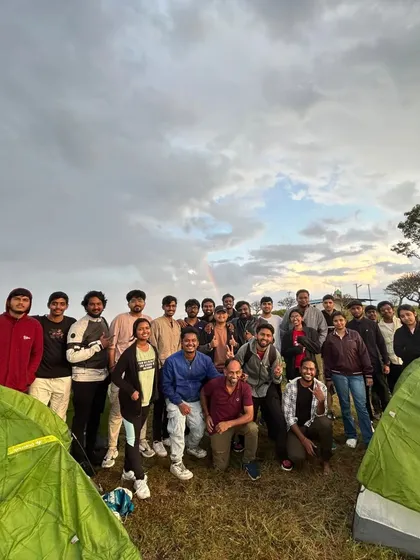 This picture says it all. A great group of people, tents pitched against a stunning sunset, and even a rainbow to top it off. This was a perfect moment from our camping trip at Narayana Giri.
