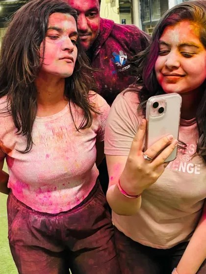 Capturing fun selfies during our Holi party. It's all about making memories together.
