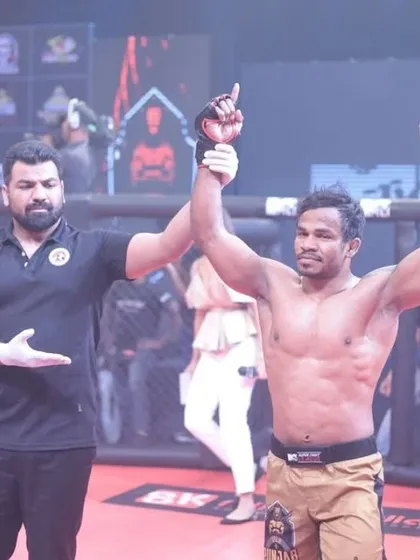 This is the result of all the struggle and sweat. One of my fighters, Kantharaj Agasa, having his hand raised in victory after a dominant performance in the Super Fight League. My training prepares you for the ultimate test in the ring.