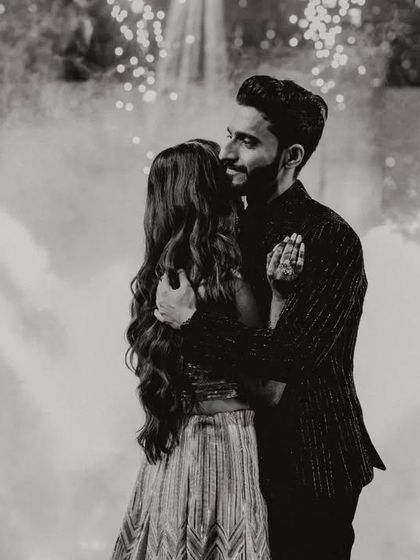 A timeless black and white shot of Hilesh and Ankita's first dance, capturing the romance and elegance of the moment.