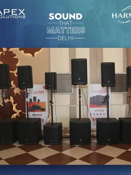 A display of various JBL PA systems, including portable column arrays and point source speakers on stands with subwoofers. This image from a 'Sound That Matters' demo event highlights the flexible and scalable sound solutions I have available.