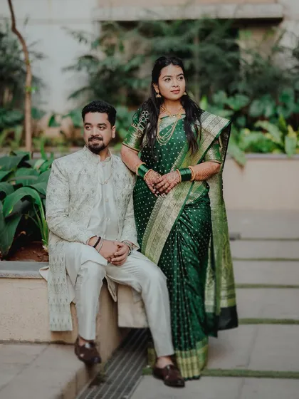 A regal and elegant portrait of the couple in a garden. Their poised and confident postures create a timeless and sophisticated image.