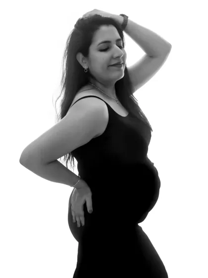 A classic black and white silhouette of the mother-to-be. This shot is simple, powerful, and beautifully highlights the shape of your growing bump.