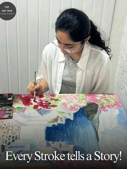 Every brushstroke tells a story. This student is carefully working on a beautiful landscape painting, capturing the delicate details of the flowers and water.