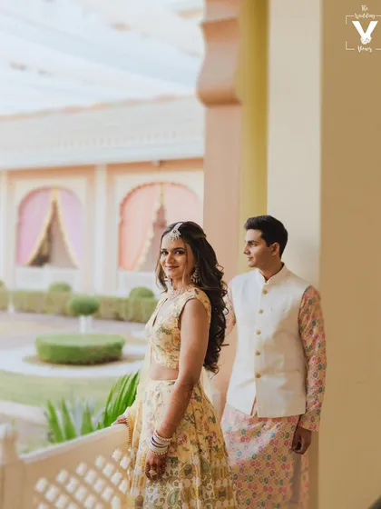 A lovely portrait of the couple on a balcony at the Indana Palace in Jodhpur. The architectural details and soft light create a romantic and regal setting for their pre-wedding photos.