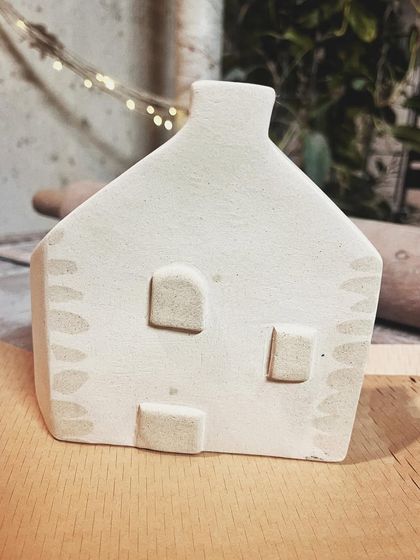 This wonderful couple completed their beginner's course together. They created everything from a coiled Christmas tree to an incredible sgraffito self-portrait.