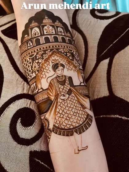 A beautiful portrait of a groom in his royal attire, covering the forearm.