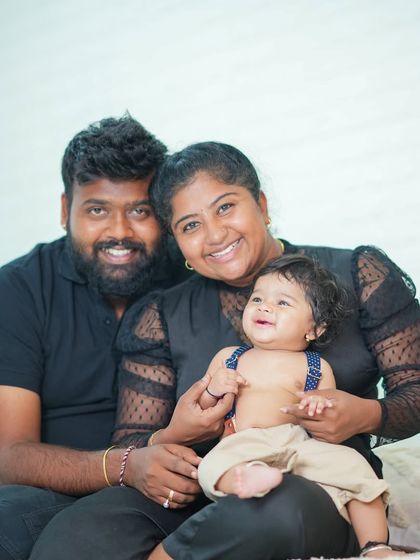 A duplicate of image 234, a sweet family portrait celebrating a six-month milestone.