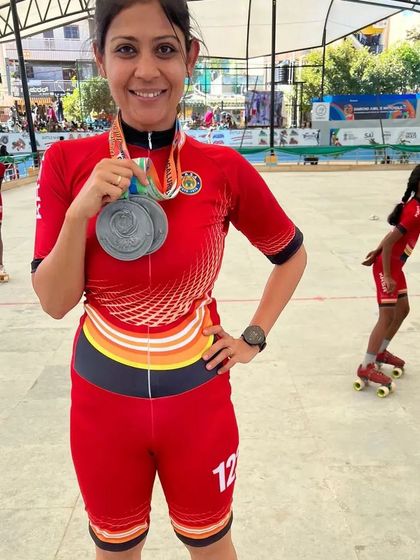 Aditi, one of our masters skaters, proudly displaying her two silver medals from the 60th National Championships.