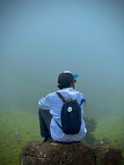 Taking a moment of solitude to enjoy the foggy, green landscape of Mandalpatti.