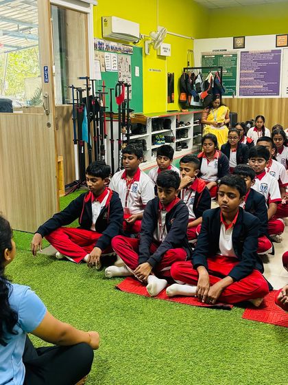 Mental conditioning is key. Carmel Academy shooters participate in a meditation session to improve focus and concentration before their training.