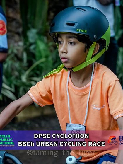 A close-up shot of a young rider, showing the focus required even at a young age. Every participant is a champion for showing up and giving their best.