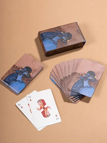 A clean, top-down shot of a deck of playing cards, fanned out to show the design. This is a classic and effective way to showcase the product for e-commerce.
