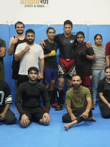 This is our tribe. A diverse group of individuals united by a common goal: to grow stronger, inside and out. It doesn't matter where you start; on this mat, we are all fighters.