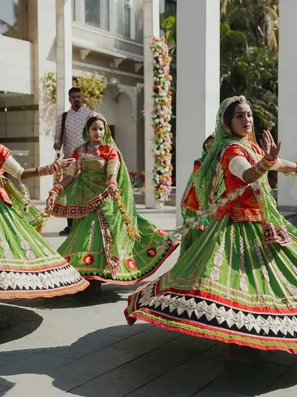 The graceful twirl of Ghoomar dancers, a vibrant and essential part of a traditional Rajasthani welcome.